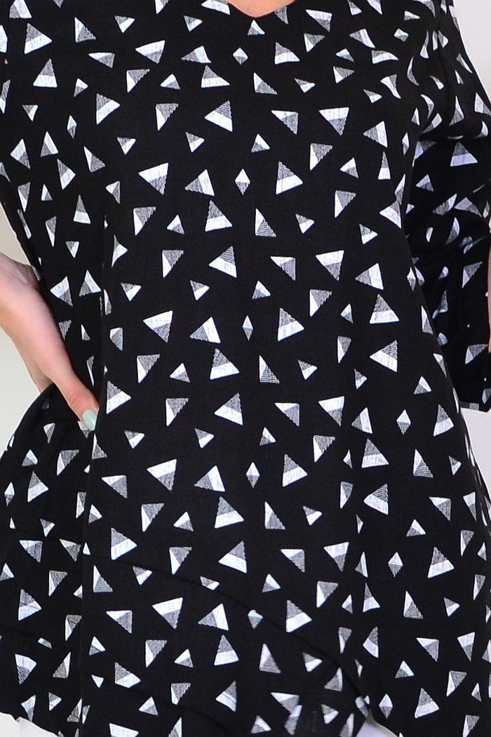 Black and grey triangle-pattern linen blend tunic top by Ruby Rain, shown on a hanger with a relaxed fit and casual style.