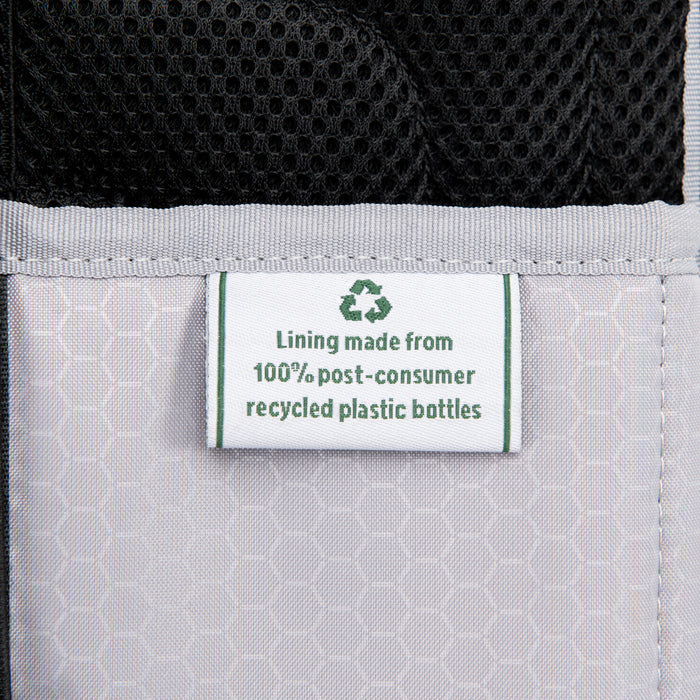 Up close material tag of Travelpro Maxlite 5 Carry-On Rolling Underseat Bag Lining made from 100% recycled bottles