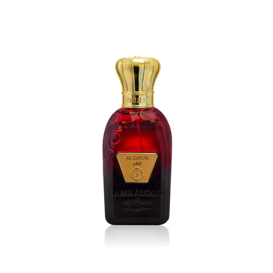 Luxury Al Ghur perfume bottle by JAMR AL OUD with gold crown cap on white background