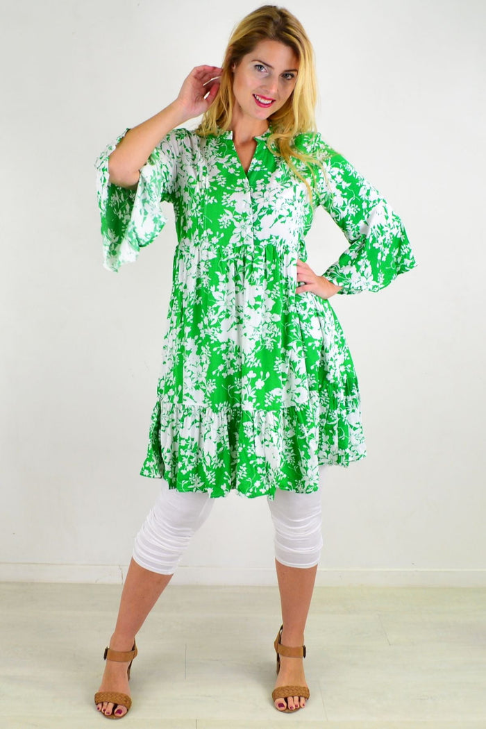Apple green sweet citrus tunic dress with frill sleeves by Willow Tree, displayed on a hanger against a white background.