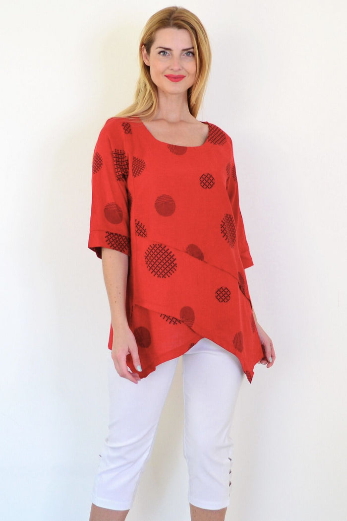 Black circle linen blend tunic top by Ruby Rain, featuring a relaxed fit and stylish design, displayed on a hanger.