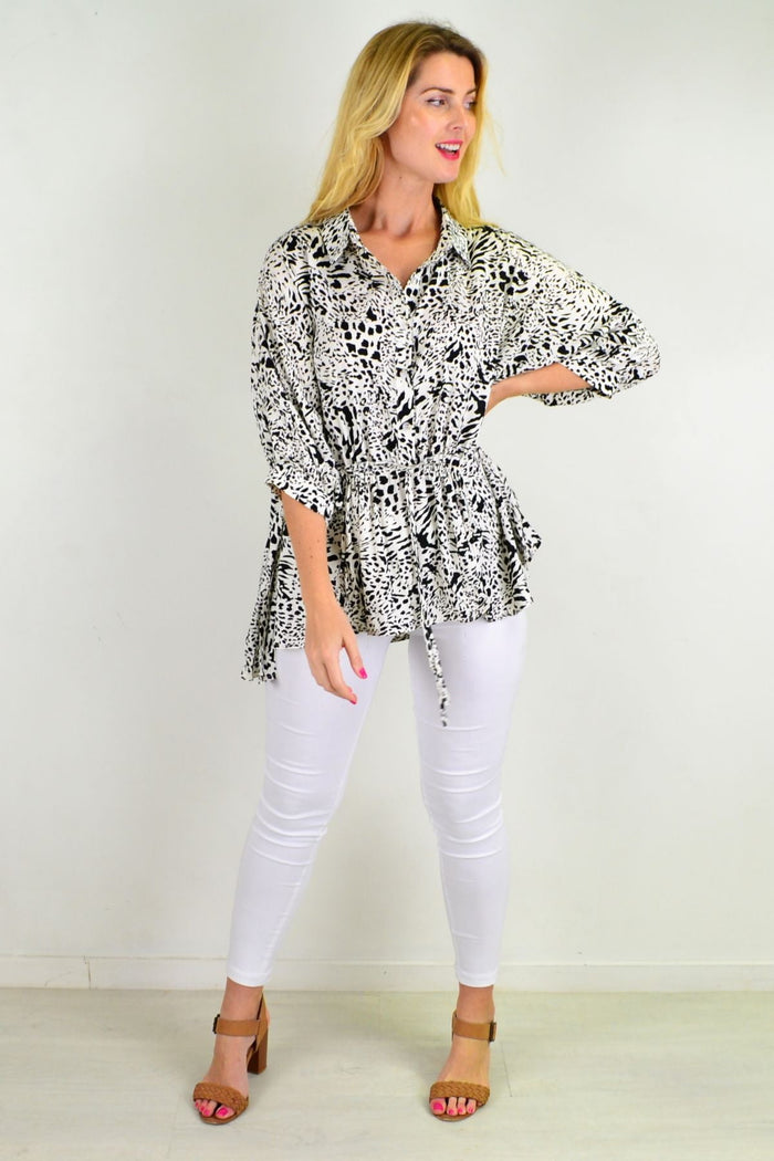 Black Giraffe Print Relaxed Fit Tunic Blouse by Hourglass, featuring a loose fit and stylish giraffe pattern on soft black and white fabric.