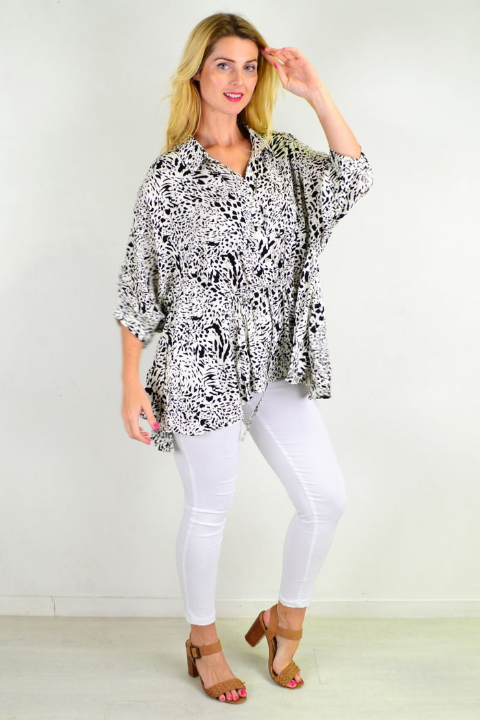 Black and white giraffe print relaxed fit tunic blouse by Hourglass, featuring a loose, comfortable design and stylish animal print pattern.