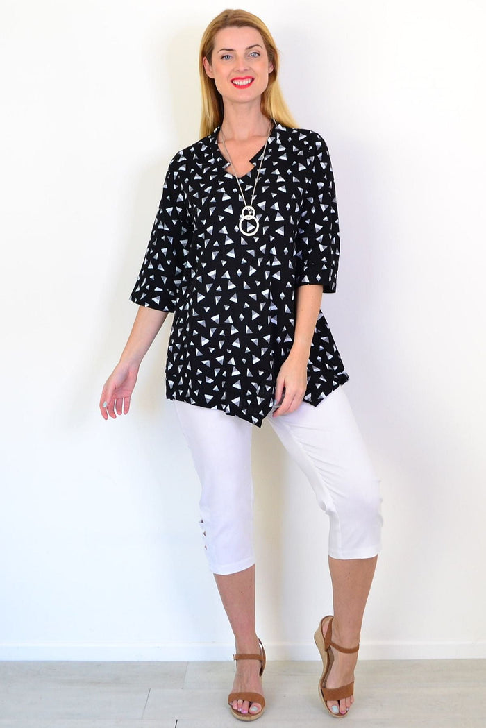 Black and grey triangle linen blend tunic top by Ruby Rain, featuring a relaxed fit and stylish design, shown on a model.