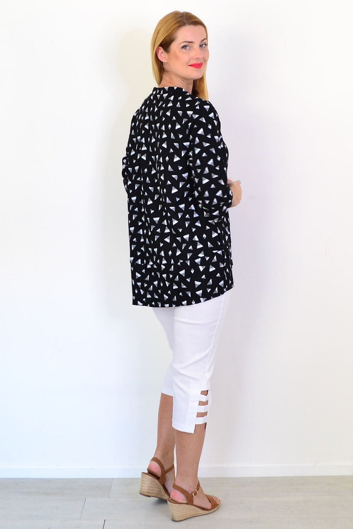 Black and grey triangle linen blend tunic top by Ruby Rain, featuring a relaxed fit and stylish geometric pattern.
