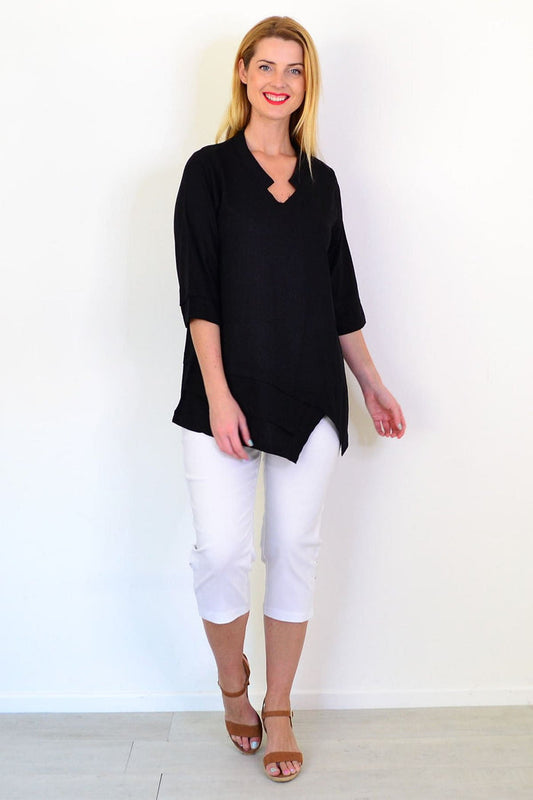 Black linen blend tunic top by Hourglass, featuring a relaxed fit and stylish design, shown on a model.
