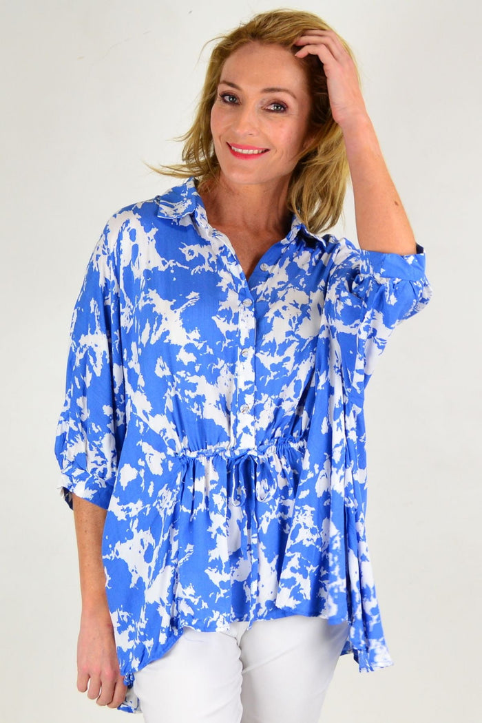 Blue Follow Me Relaxed Fit Tunic Blouse by Hourglass, featuring a casual, loose-fitting design with long sleeves and a rounded neckline.