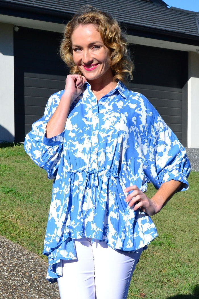 Blue Hourglass Follow Me relaxed fit tunic blouse with short sleeves and a round neckline, perfect for summer.