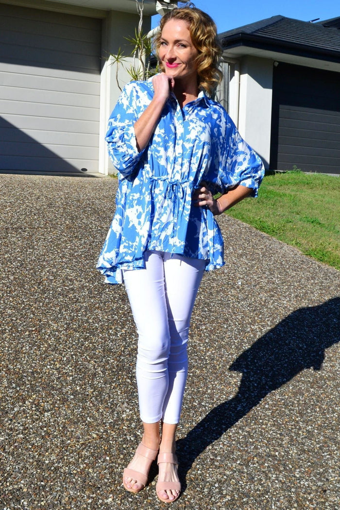 Blue Hourglass Follow Me Relaxed Fit Tunic Blouse with short sleeves and a flowy silhouette, perfect for summer.