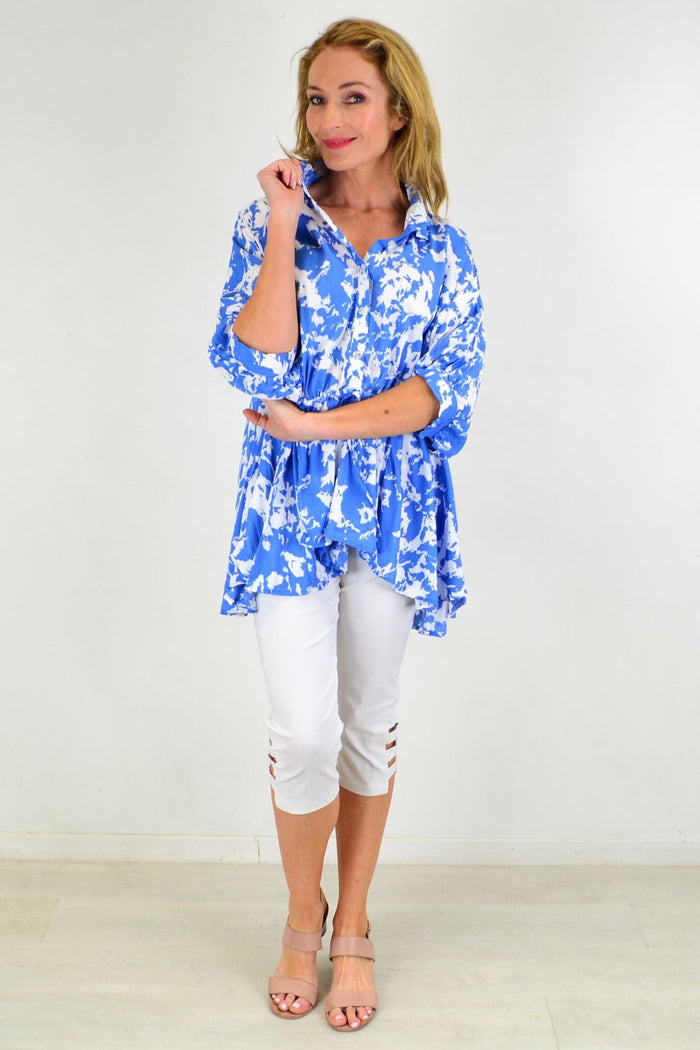 Blue Hourglass Follow Me Relaxed Fit Tunic Blouse with long sleeves and a flowy, comfortable design, shown on a model.