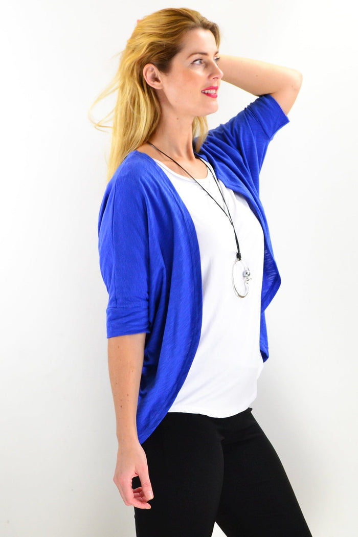 Blue mini shrug cardigan from Freez, casual tunic style with long sleeves and a relaxed fit, displayed on a hanger.