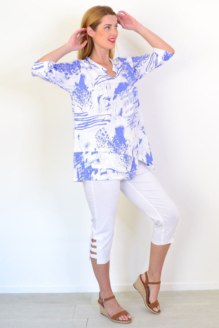 Blue Splash linen blend tunic top by Hourglass featuring a relaxed fit and vibrant blue splash pattern.