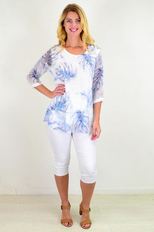 Blue tropical sequin tunic top by Ruby Rain featuring vibrant tropical print and shimmering sequins, casual and stylish for warm weather.