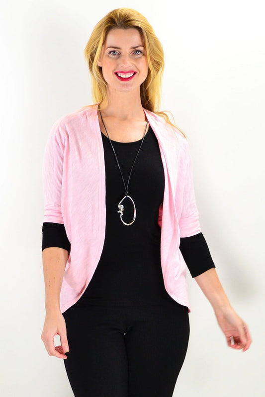 Freez blush mini shrug cardigan worn as a tunic, featuring lightweight fabric and open front design.