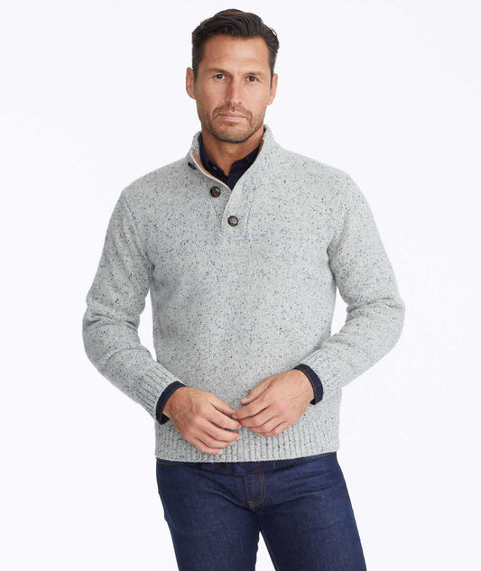 Model wearing a Grey Button-Neck Donegal Sweater