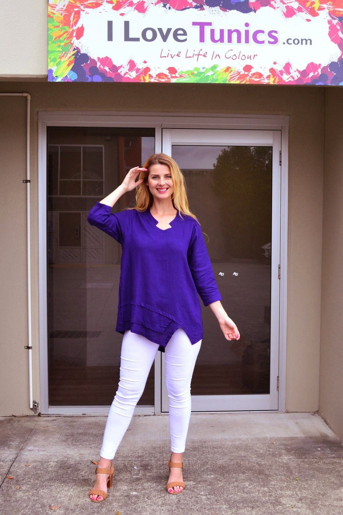 Deep purple linen cotton tunic top by Ruby Rain, featuring a relaxed fit and casual style, displayed on a hanger.