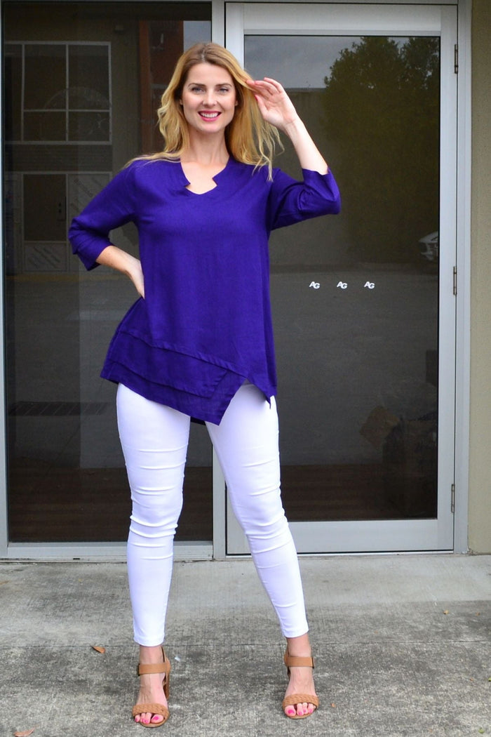 Deep purple linen cotton tunic top by Ruby Rain, shown flat with long sleeves and a relaxed fit.