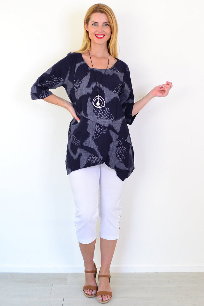 Denim Forest linen blend tunic top by Ruby Rain featuring a relaxed fit, long sleeves, and a stylish casual design.