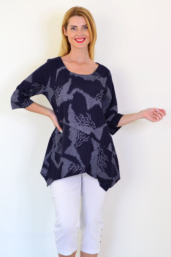 Denim Forest Linen Blend Tunic Top by Ruby Rain, featuring a relaxed fit and natural fabric texture, displayed on a hanger.