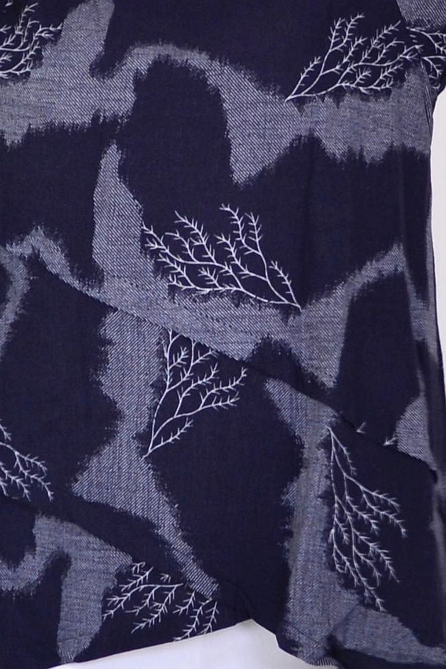 Denim Forest Linen Blend Tunic Top by Ruby Rain featuring a relaxed fit and casual style, displayed on a hanger against a neutral background.