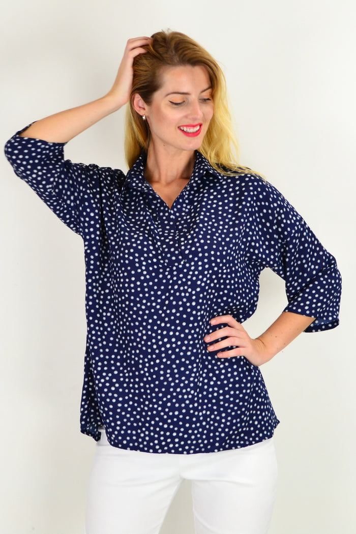 Stylius Dot in a Dot Tunic Top featuring a playful dotted pattern, lightweight fabric, and relaxed fit for casual wear.