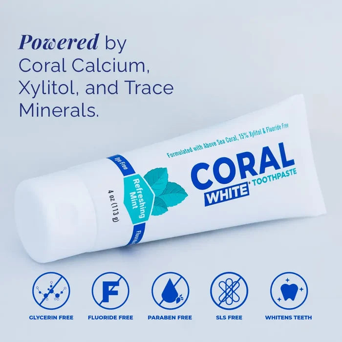 Tube of Coral White toothpaste with product features listed on a light blue background
