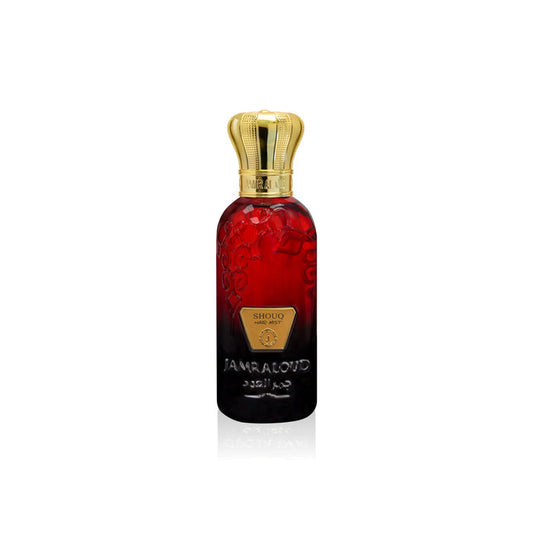Jamr Al Oud Shouq hair mist perfume in red and gold luxury bottle on white background