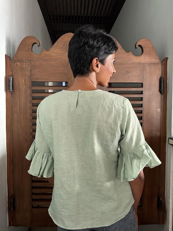 Green embroidered linen top