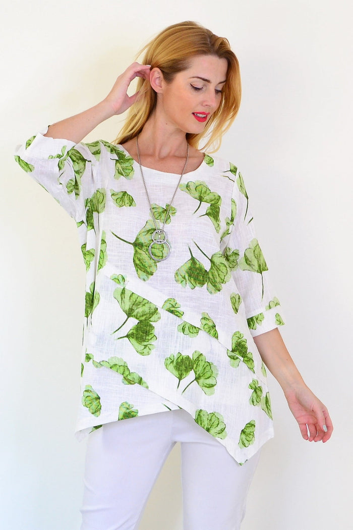 Green flower linen blend tunic top by Ruby Rain, featuring a relaxed fit, floral pattern, and lightweight fabric.