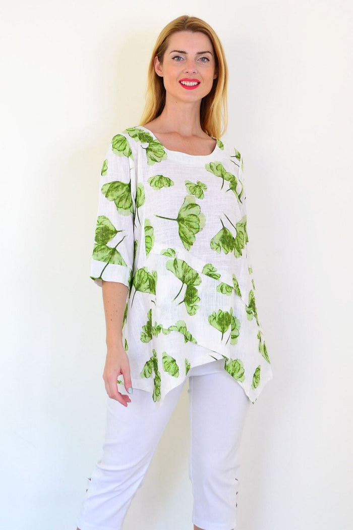 Green flower linen blend tunic top by Ruby Rain, featuring a relaxed fit with floral patterns and lightweight fabric.
