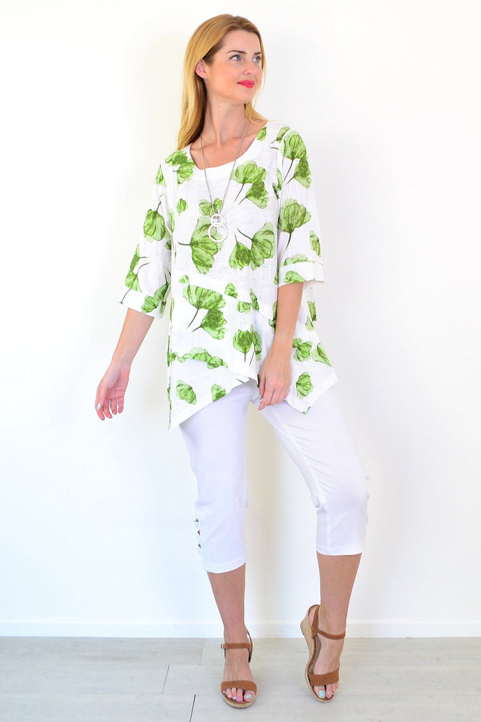 Green flower linen blend tunic top by Ruby Rain, featuring a relaxed fit with floral pattern and lightweight fabric.