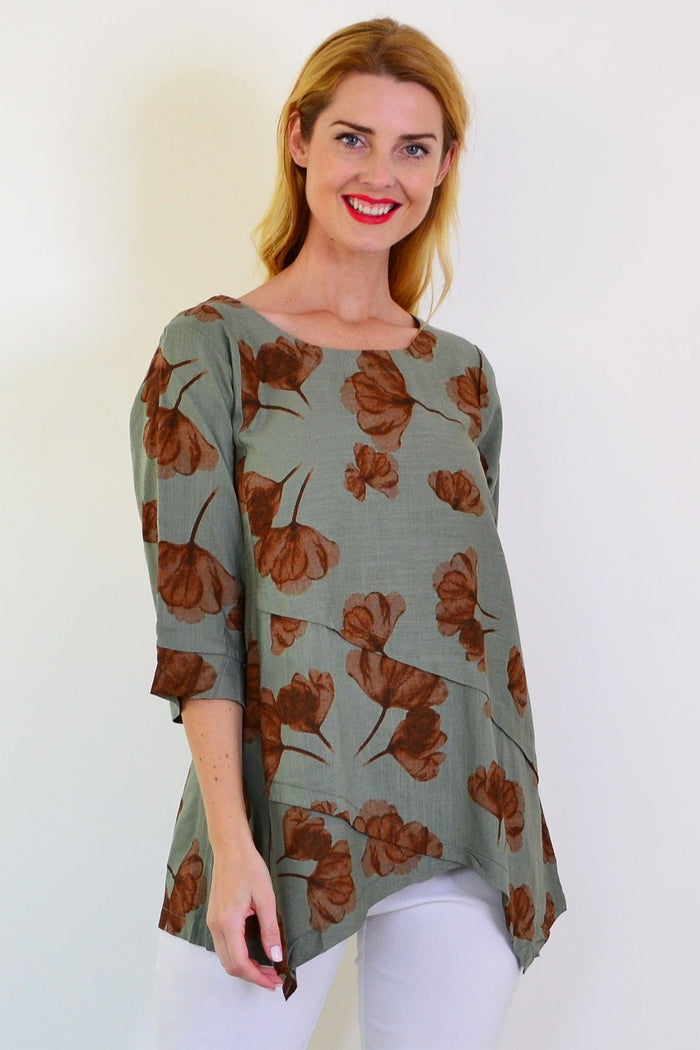 Khaki brown flower linen blend tunic top by Ruby Rain, featuring floral pattern and relaxed fit, displayed on a hanger.