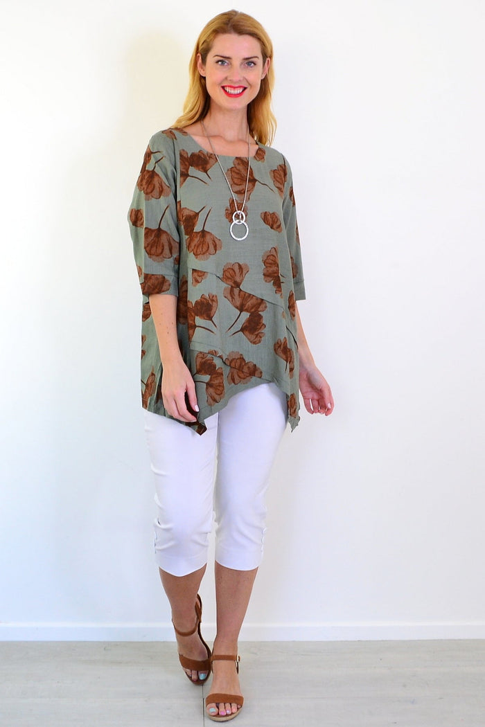 Khaki brown flower linen blend tunic top by Ruby Rain, featuring a relaxed fit and floral pattern, shown on a model.
