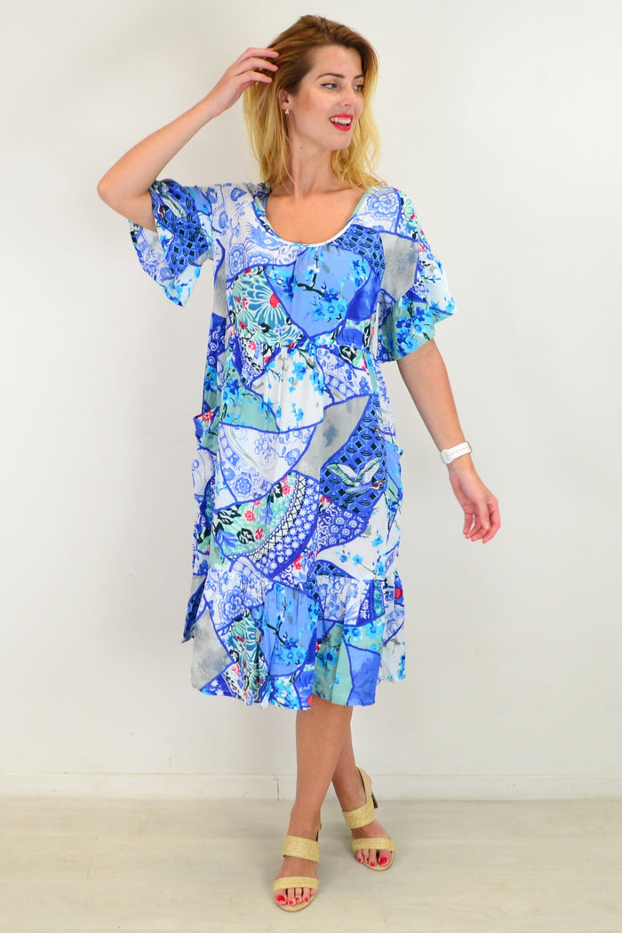Orientique Kintsugi Tunic Dress featuring a vibrant, artistic design with a relaxed fit and flowy fabric.