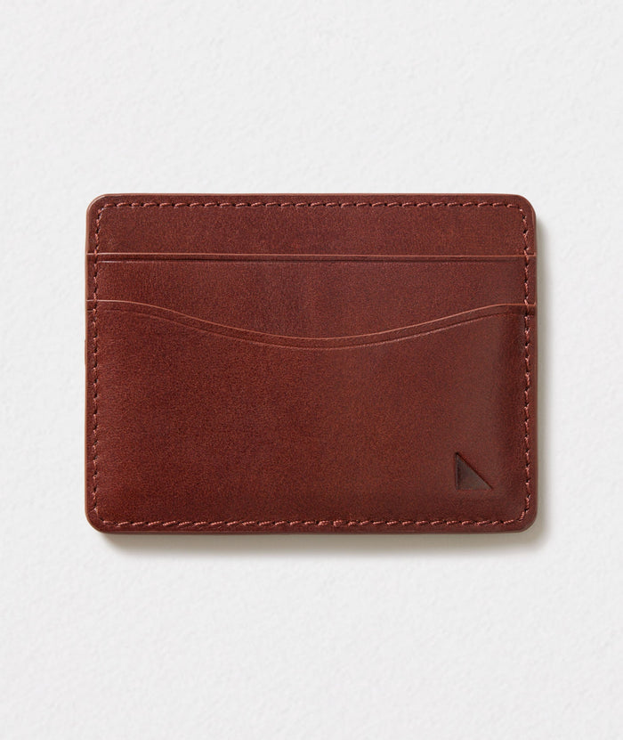 UNTUCKit leather card case in brown.