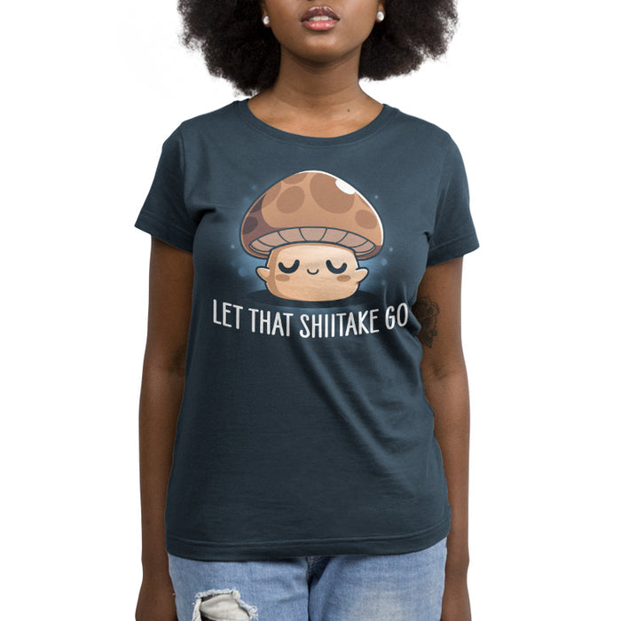 Premium Cotton T-shirt_TeeTurtle denim blue Let That Shiitake Go apparel featuring a brown zen mushroom with its eyes closed and caption reads, "let that shiitake go".
