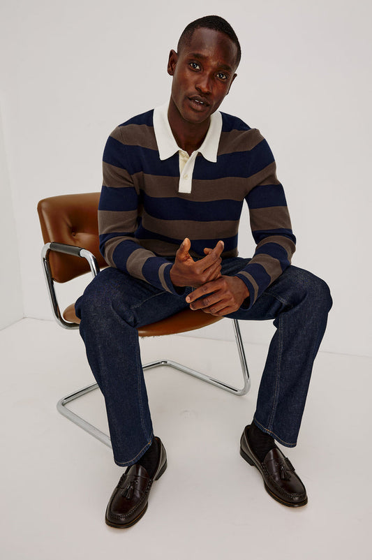 Luther Rugby Sweater in Cotton Knit With Contrast Polo Collar, Quarter-Button Placket, Relaxed Fit, and Long Sleeves in Navy Carob Stripe Colorway - Full Body View Featured on Model