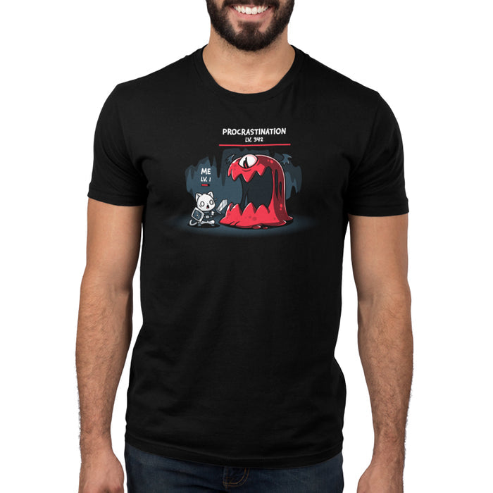 Premium Cotton T-shirt_TeeTurtle black Me Vs. Procrastination featuring a cat knight labeled "ME LV. 1" standing nervously in front of a giant red monster labeled "PROCRASTINATION LV. 342" in a dark, cavernous setting.