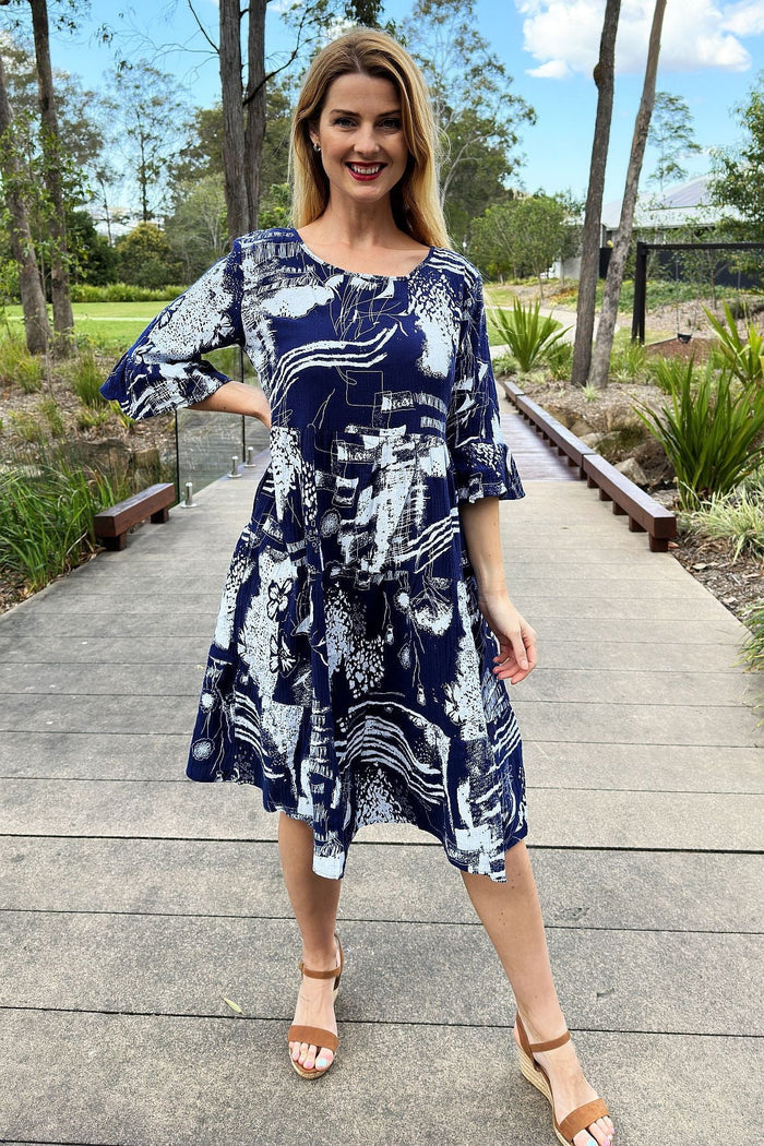 Navy and white abstract tunic dress by Hourglass, featuring a stylish loose fit and modern print, perfect for casual wear.