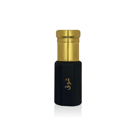 Luxury Jamr Al Oud black and gold perfume bottle with Arabic script on white background