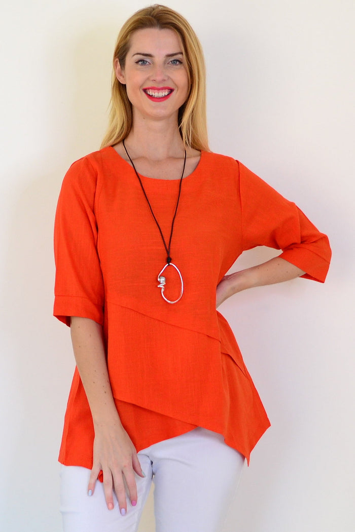 Orange layered linen blend tunic top by Ruby Rain featuring a flowing, relaxed fit with layered design and lightweight fabric.