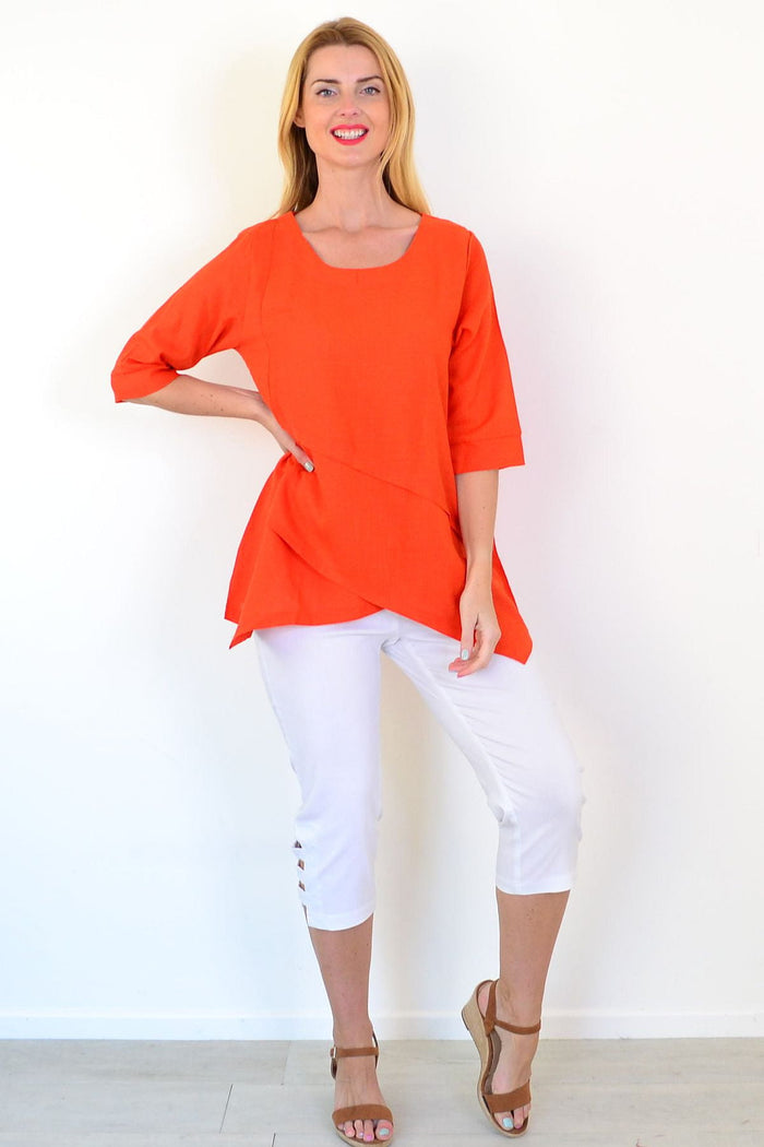 Orange layered linen blend tunic top by Ruby Rain, shown with flowing fabric and relaxed fit, perfect for casual wear.