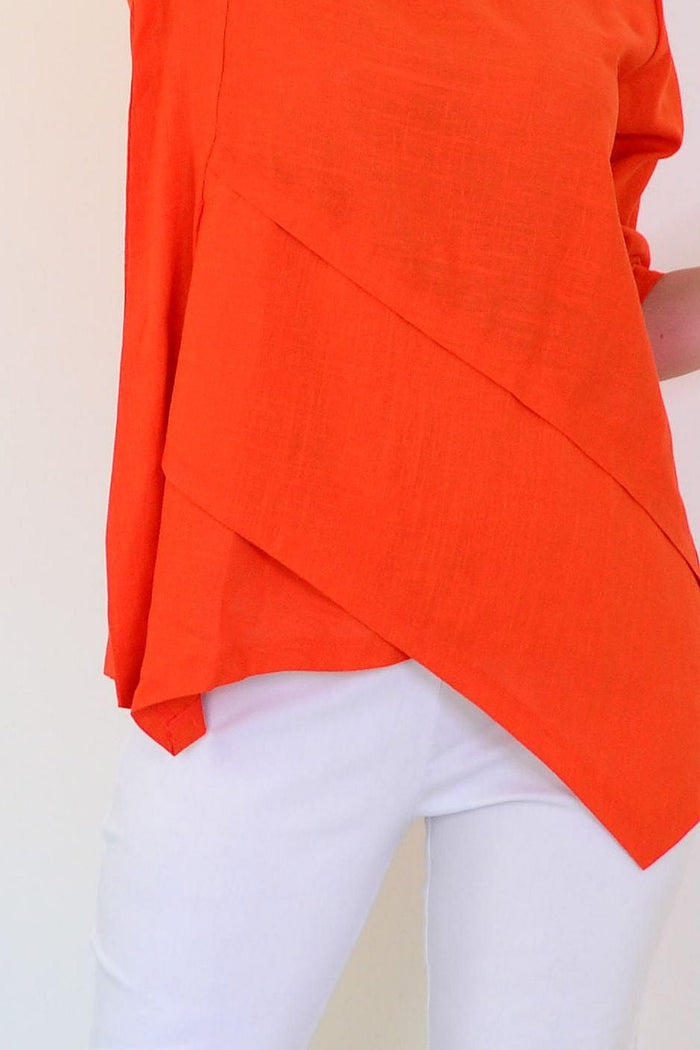 Orange layered linen blend tunic top by Ruby Rain, featuring a relaxed fit, long sleeves, and a stylish layered design.