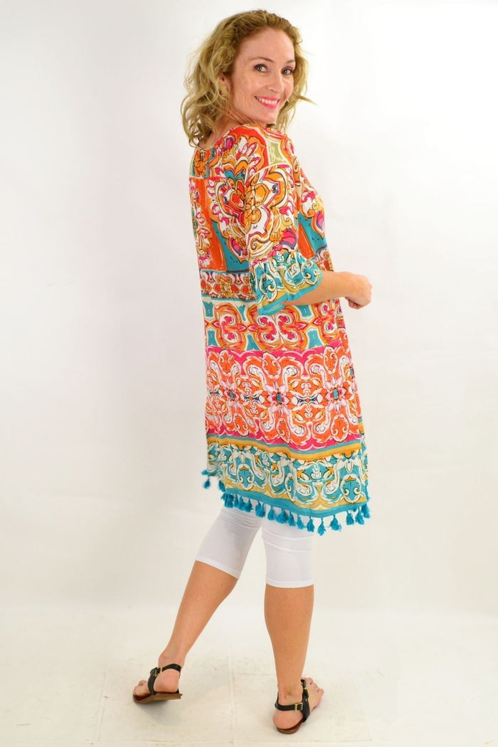 Orientique Mauresque 3/4 sleeve tunic dress with intricate patterns, flowing fabric, and relaxed fit, perfect for casual or semi-formal wear.