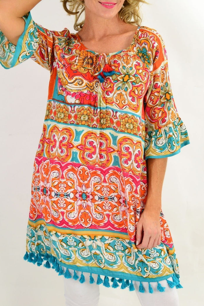 Orientique Mauresque 3/4 sleeve tunic dress featuring floral patterns and relaxed fit, perfect for casual or chic summer wear.