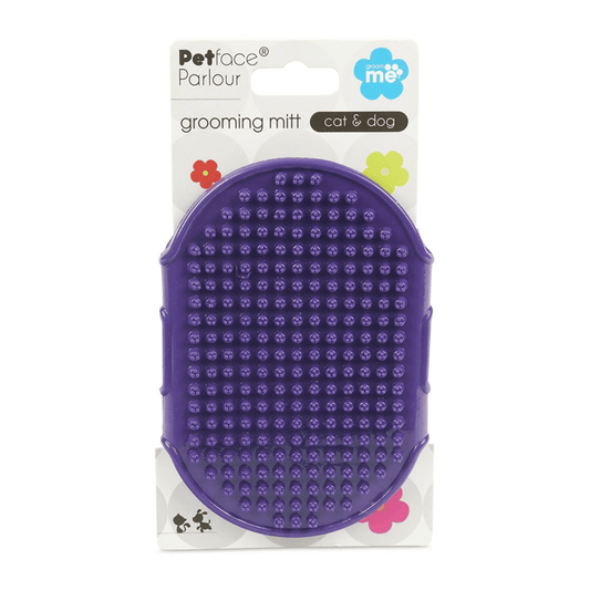 Purple rubber grooming mitt, packed on a cardboard sleeve on a white background.