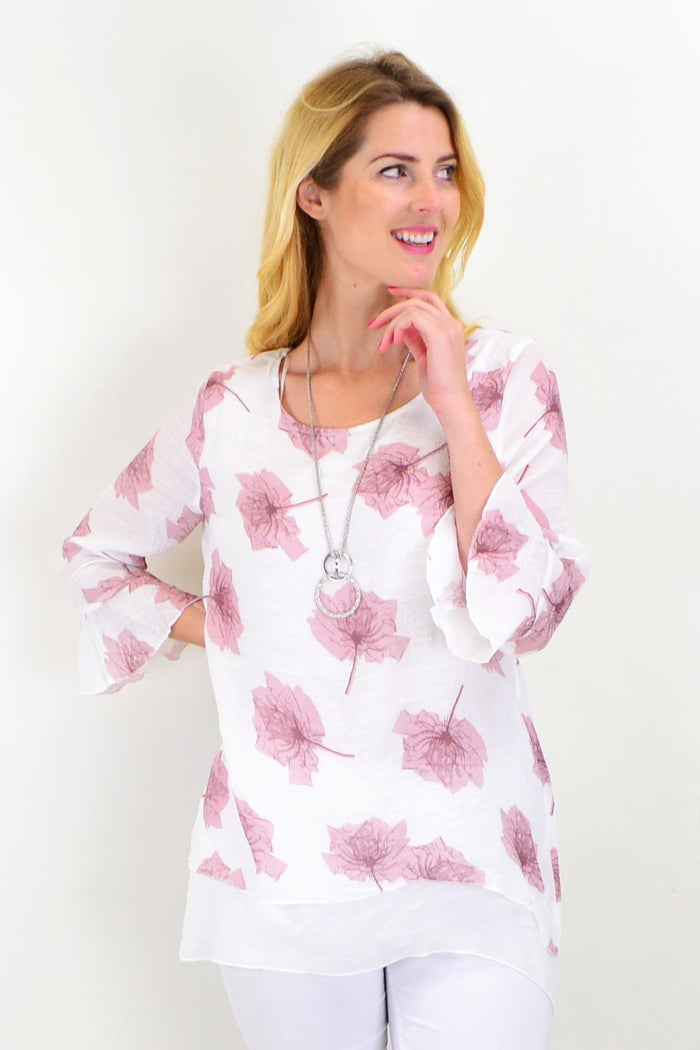 Pink Caroline Morgan layered tunic top with maple leaf pattern, featuring a relaxed fit and long sleeves.