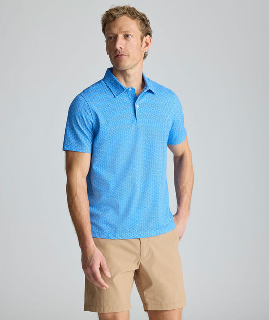 Model is wearing UNTUCKit CottonTek Polo in blue.