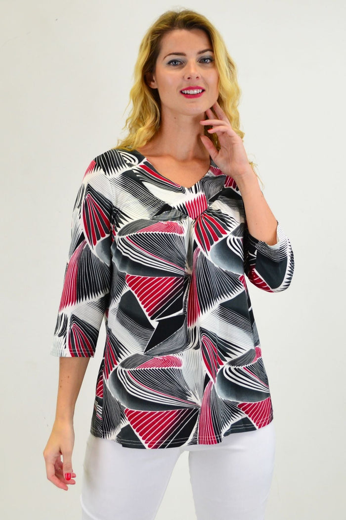 Red Matrics stretch tunic top from I Love Tunics, featuring a comfortable fit and stylish design, shown on a hanger.