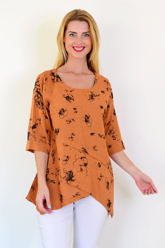 Rust layered linen blend tunic top from Ruby Rain, featuring a relaxed fit with textured fabric and layered design.